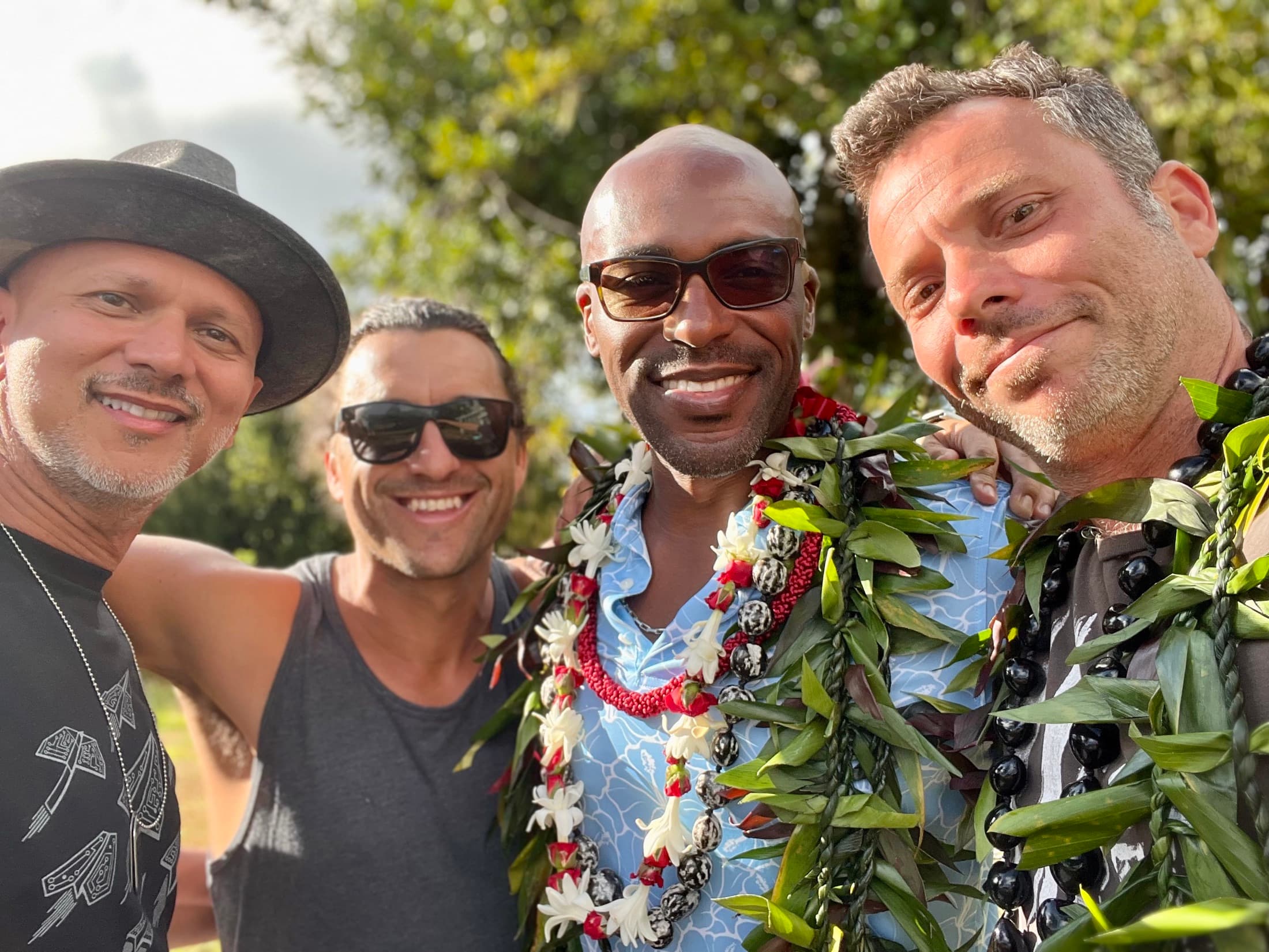 Dr. Wayne Byrd and men gathered outdoors in Brotherhood